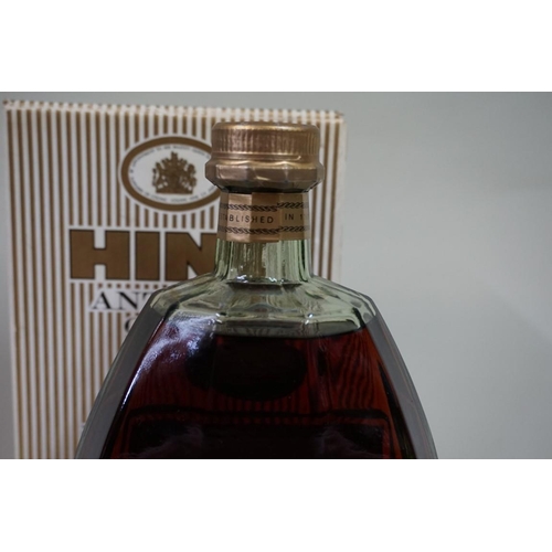 586 - A 24 fl.oz. bottle of Hine Vieille Fine Champagne cognac, probably 1960s bottling, in card box.... 