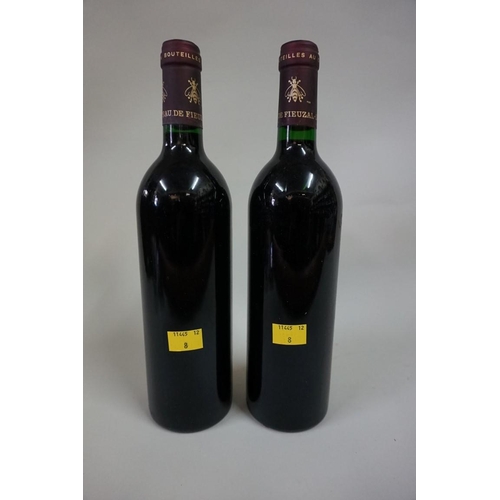 593 - Two 75cl bottles of Chateau de Fieuzal, 1986, Pessac-Leognan. (2)