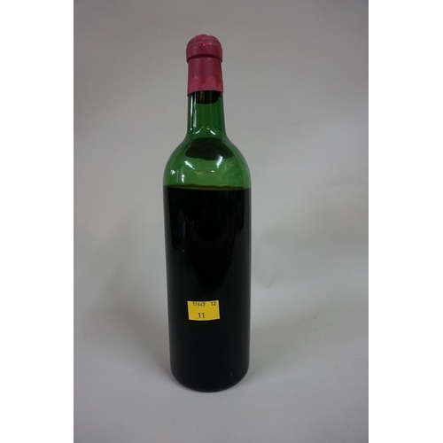 597 - A bottle of Chateau Haut Bages Monpelou, 1961, (London bottled Army & Navy Stores).&nb... 