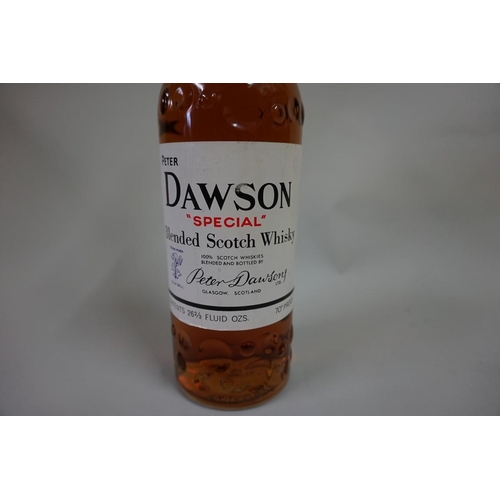 599 - An old 26 2/3 fl.oz. bottle of Peter Dawson 'Special' blended whisky, 1960s bottling.... 