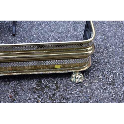 1003 - A brass fire fender, 103cm wide; together with a folding cake stand.