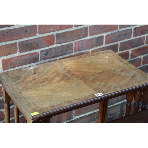 1039 - An antique nest of three tables; together with another nest of tables. 