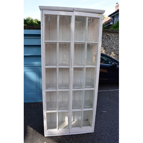 1056 - A painted pine display cabinet, 89cm wide x 36cm deep x 203cm high.