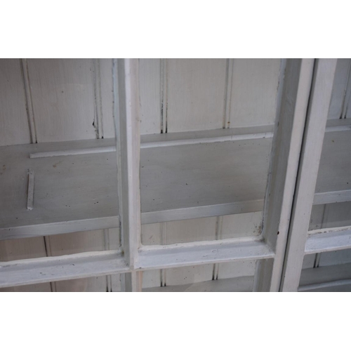 1056 - A painted pine display cabinet, 89cm wide x 36cm deep x 203cm high.