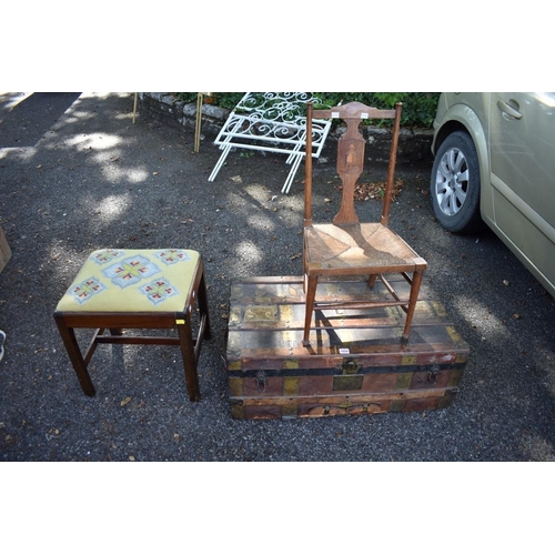 1058 - An old luggage trunk; together with a child's chair and a stool.