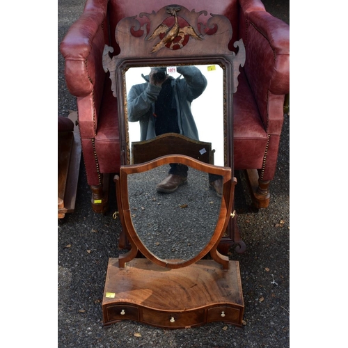 1071 - An 18th century fretwork mirror; together with a shield shaped toilet mirror.