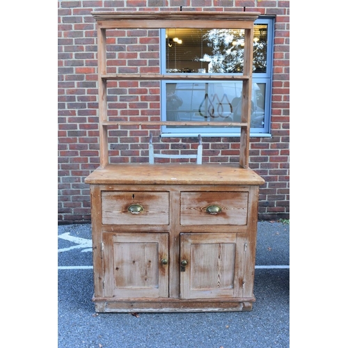 1080 - A pitch pine dresser and rack, 112cm wide x 61.5cm deep.