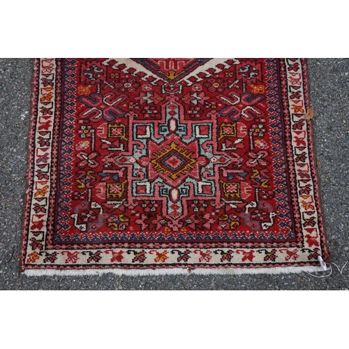1100a - A Persian runner, having seven central medallions, the central field decorated with flowers, 280 x 8... 