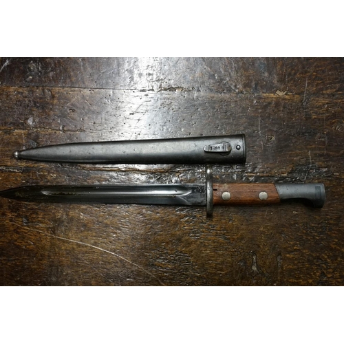 1841 - A mixed group of militaria, to include a Swiss bayonet and plastic sheath; two spike bayonets and sh... 