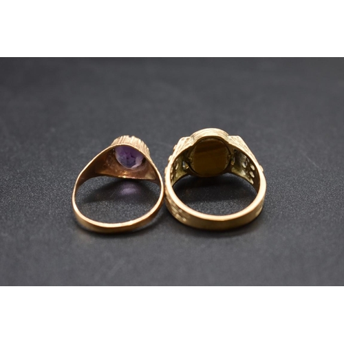 122 - A 9ct gold amethyst ring, size S 1/2; together with a 9ct gold tigers eye ring, size T 1/2, gross we... 