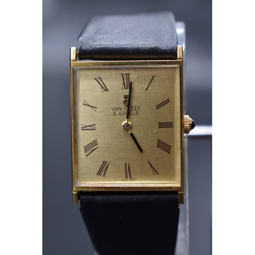 19 - A Van Cleef & Arpels Corum 18k gold manual wind wristwatch, 26mm, on black leather strap.... 