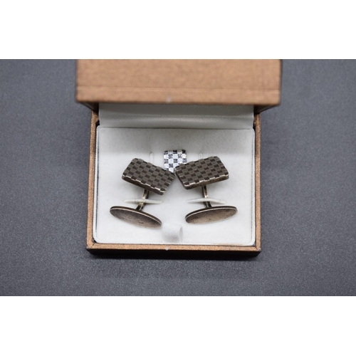 212 - A pair of Georg Jensen sterling silver checkerboard pattern cufflinks and matching tie pin, designed... 