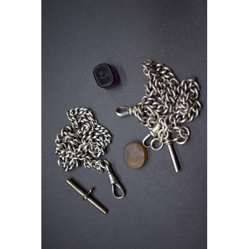 215a - Two silver Albert chains, 39cm and 36cm, 93g; together with two hardstone intaglio seals. (4)... 