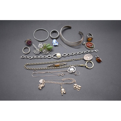 216 - A quantity of silver, white metal and other jewellery.