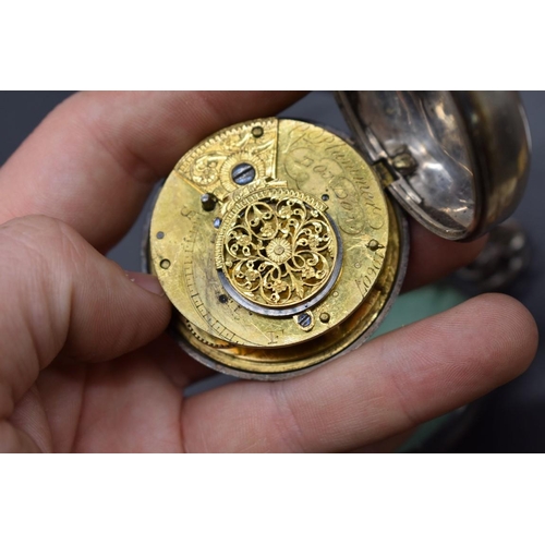 220 - A silver pair cased open faced pocket watch, the movement signed G Plummer London, No 10607, (s.d); ... 