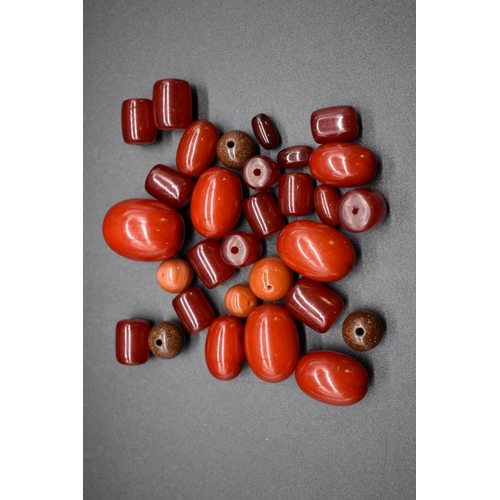 237 - A collection of Bakelite 'cherry amber' beads.