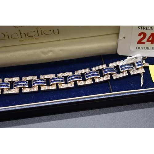 242 - An Art Deco style silver and paste bracelet, 18cm, 39g gross weight.