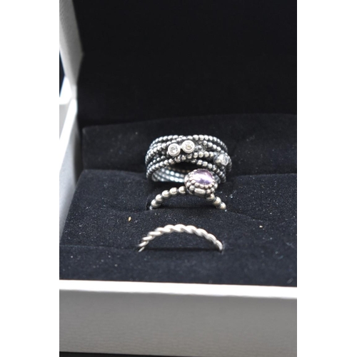 251 - A quantity of Pandora 925 silver jewellery; comprising rings, a necklace, charms and jewellery boxes... 