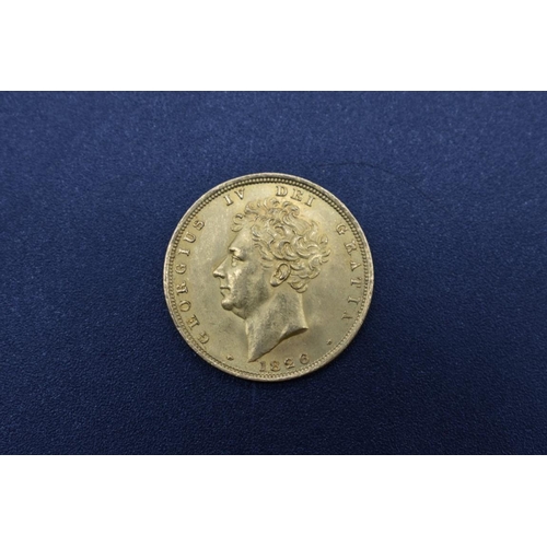 258 - Coins: a George IV 1826 gold sovereign.