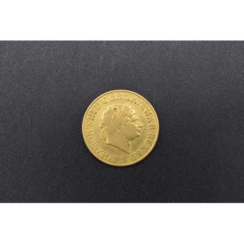 261 - Coins: a George III 1817 gold sovereign.