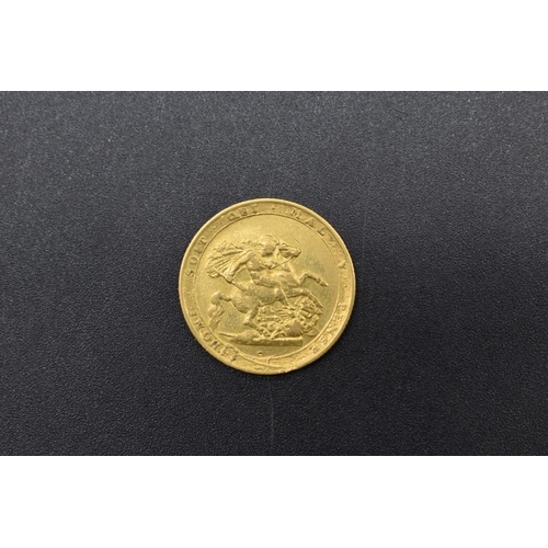 261 - Coins: a George III 1817 gold sovereign.