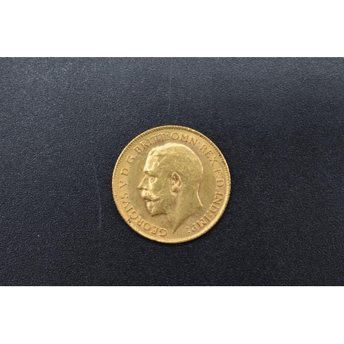 264 - Coins: a George V 1911 gold half sovereign.