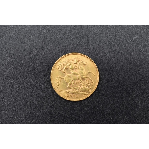 264 - Coins: a George V 1911 gold half sovereign.