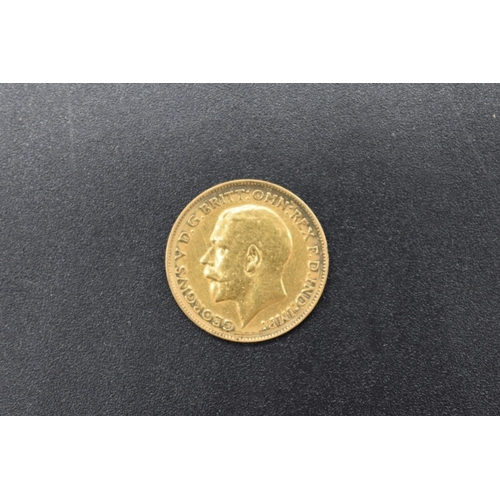 265 - Coins: a George V 1911 gold half sovereign.