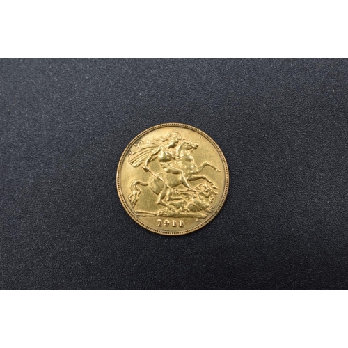 265 - Coins: a George V 1911 gold half sovereign.