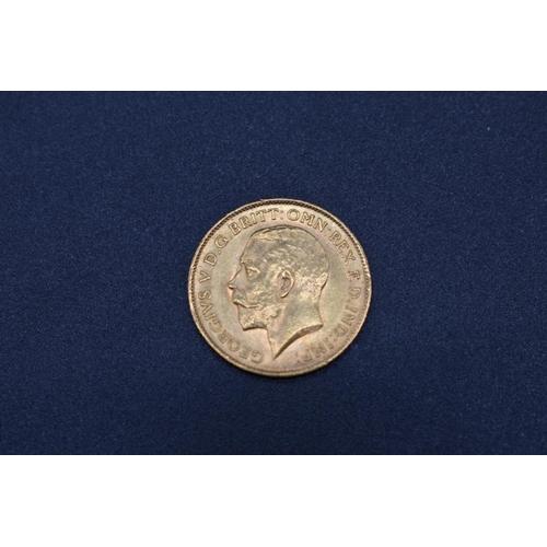 267 - Coins: a George V 1913 gold half sovereign.