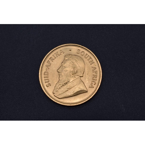 272 - Coins: a South African 1974 gold Krugerrand.