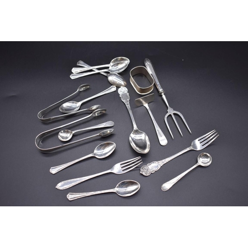 498X - A quantity of silver cutlery; to include a pair of Georgian bright cut mustard spoons and a Victoria... 