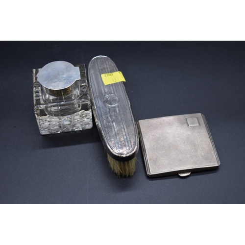 499E - A silver mounted glass inkwell, 6.4cm high; together with an engine turned silver cigarette case; an... 