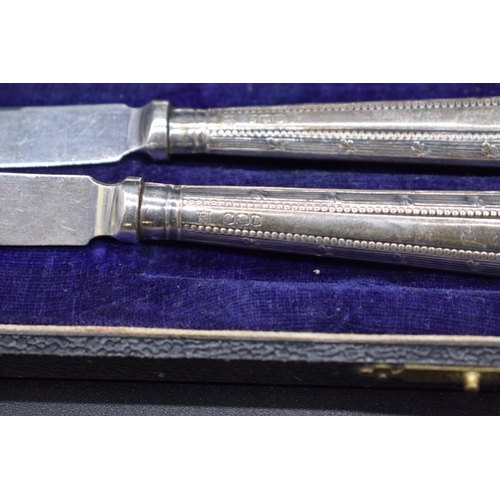 499S - A Victorian silver mounted horn handled carving knife and fork, stamped Mallett & Son Bath, hall... 