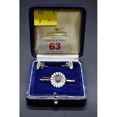 63 - A Danish sterling silver gilt and enamel daisy bar brooch and matching ear studs, by Anton Michelsen... 