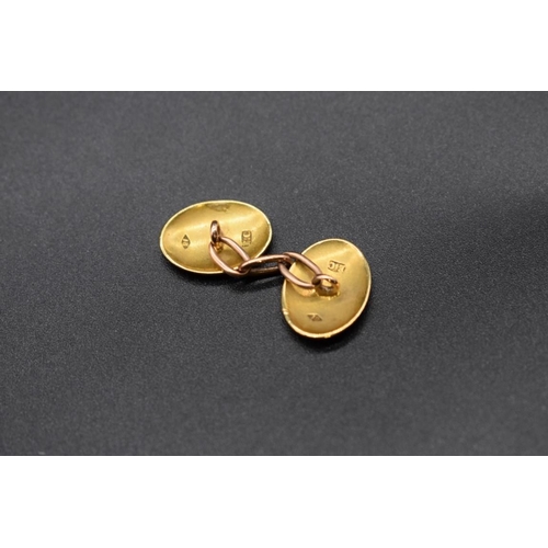 64 - A cased pair of yellow metal cufflinks, stamped 18, 17.5mm, 11.8g; together with three yellow m... 