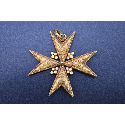 69 - An antique yellow metal Maltese cross pendant, 39mm excluding bail, gross weight 7g.... 