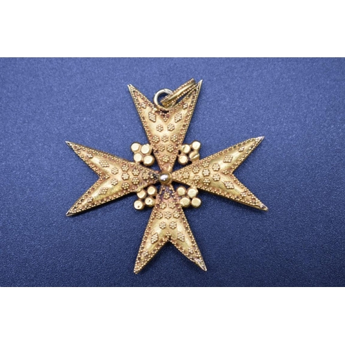 69 - An antique yellow metal Maltese cross pendant, 39mm excluding bail, gross weight 7g.... 