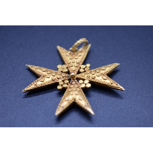 69 - An antique yellow metal Maltese cross pendant, 39mm excluding bail, gross weight 7g.... 