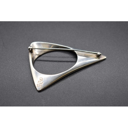 70 - A Georg Jensen sterling silver triangular brooch, designed by Henning Koppel, No 375, 57mm, 20g.... 