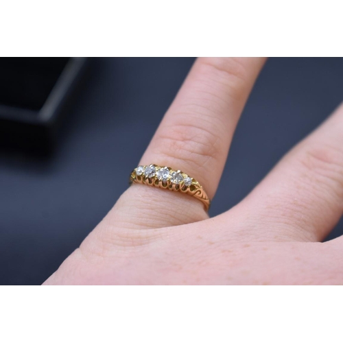 73 - An Edwardian 18ct gold diamond five stone ring, Size O, gross weight 2.2g.