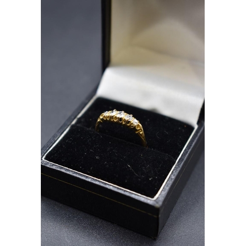 73 - An Edwardian 18ct gold diamond five stone ring, Size O, gross weight 2.2g.