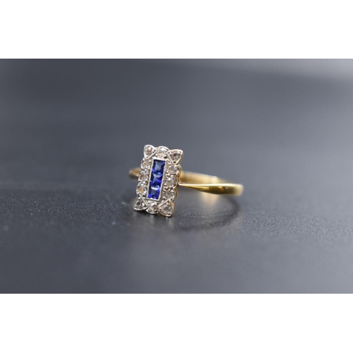 77 - An Art Deco yellow metal blue and white sapphire ring, stamped 18ct and plat, size R.... 