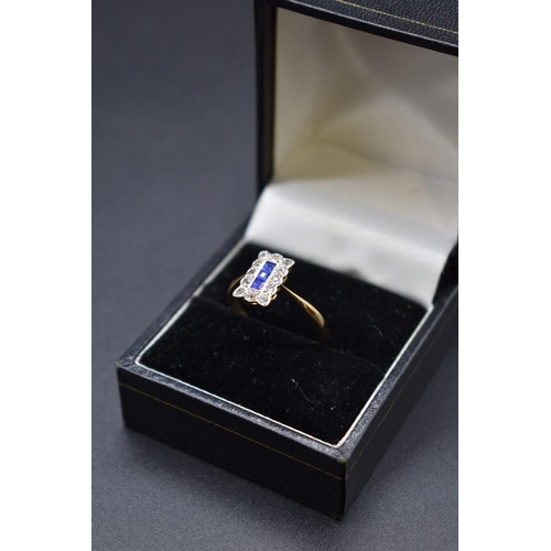 77 - An Art Deco yellow metal blue and white sapphire ring, stamped 18ct and plat, size R.... 