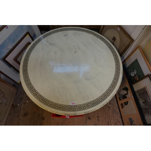 1359 - A 1950s/60s brass and faux marble circular low occasional table, 93.5cm diameter.... 