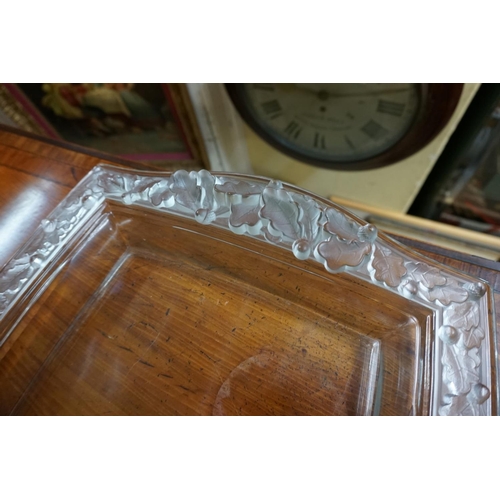 1365 - A Lalique 'Chene' frosted and clear glass tray, No.3467, 46.5cm wide, (chipped).