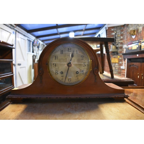 1215 - A 1930s mahogany Wellington clock, 43cm wide; together with another early 20th century mantel c... 