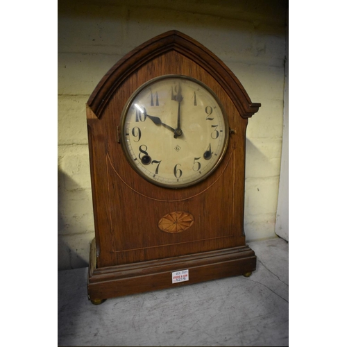 1215 - A 1930s mahogany Wellington clock, 43cm wide; together with another early 20th century mantel c... 