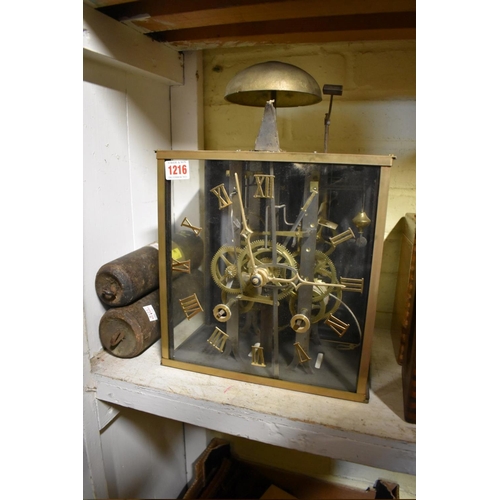 1216 - An antique French comtoise type brass and glass clock, with 10 1/2in square dial, with a pair of wei... 