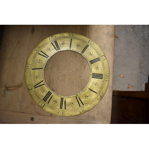 1218 - A collection of Georgian clock dials and chapter rings; together with another dial plate. (10) ... 